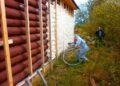Утепление дома из бруса: наиболее эффективные методы и их преимущества